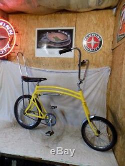 vintage yellow schwinn bike