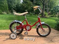 Schwinn Vintage Lil Tiger Stingray bike with training wheels, red