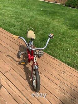 Schwinn Vintage Lil Tiger Stingray bike with training wheels, red