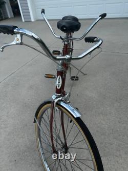 Vintage Schwinn Deluxe Twinn bicycle. Bronze color, great condition for age